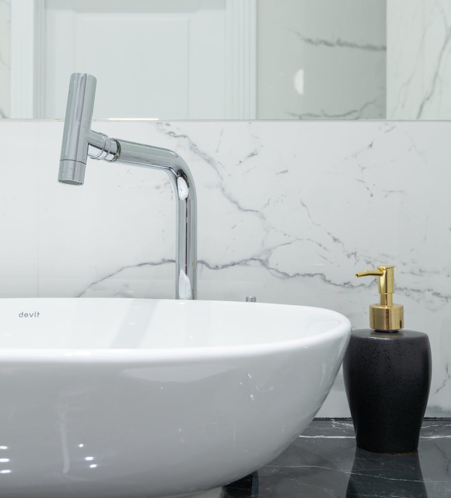 Photo of a Bathroom Sink with chrome faucet.